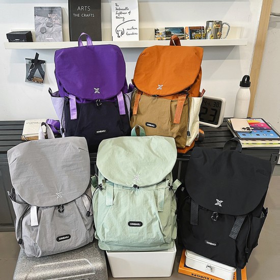 Lightweight backpack Large-capacity work bags for junior high school students, new ultralight backpacks for outdoor travel and commuting, suitable for university students.